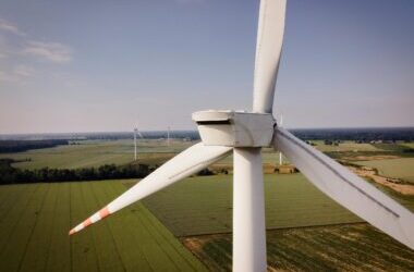 Aerial view of wind turbines generating renewable energy in rural Poland.